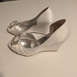 Touch of Nina Wedges